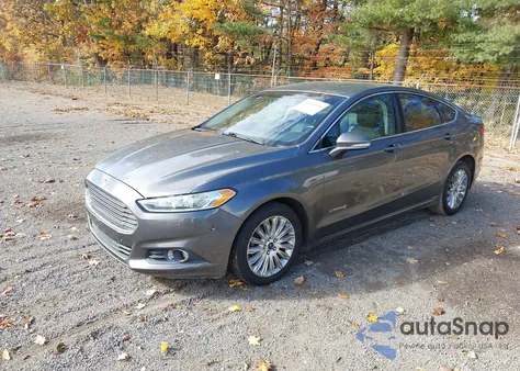 2013 Ford Fusion Hybrid Se z USA, uszkodzony, nr VIN 3FA6P0LU6DR379831